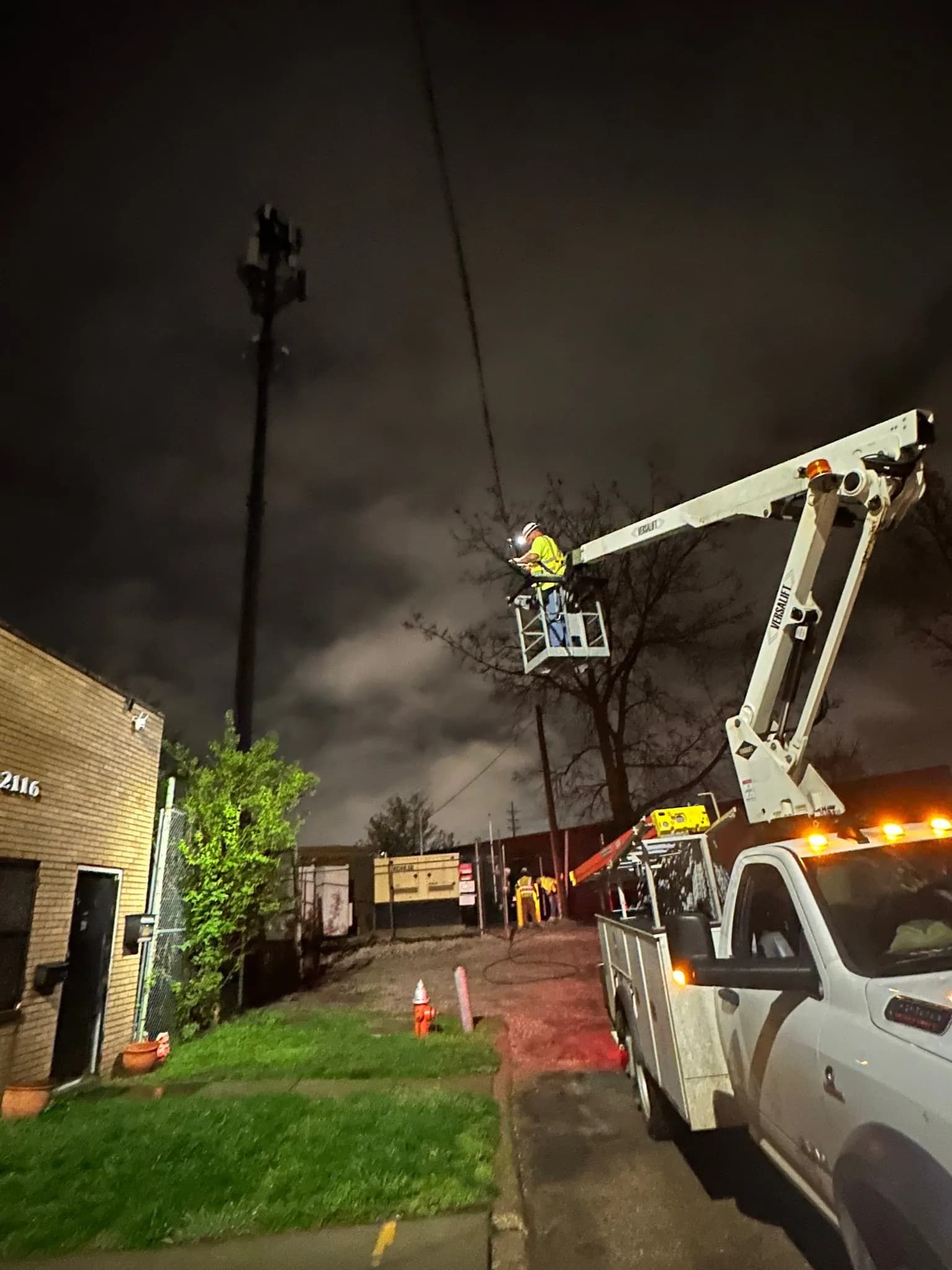 Aerial cable construction crew working on lines